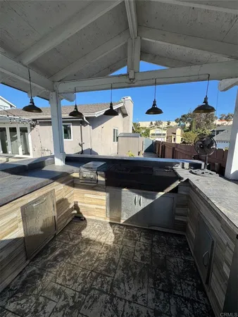 a view of room with wooden floor