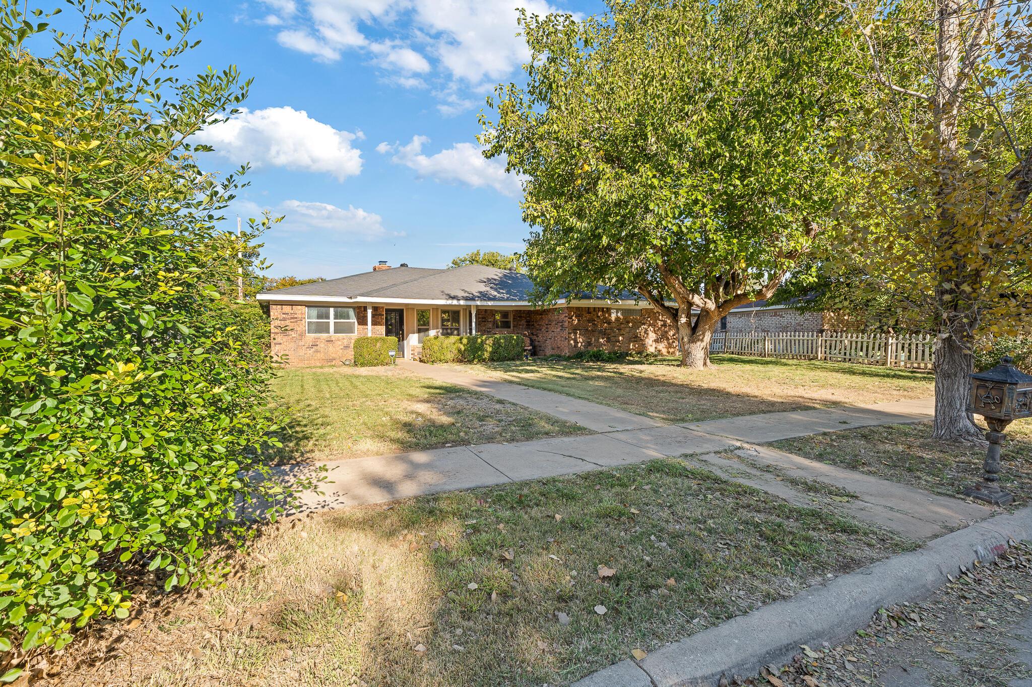 7602 Canode Drive Amarillo, TX 79121 - Photo 2 of 26 a view of house with yard