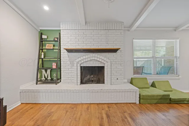 a living room with furniture and a bathtub