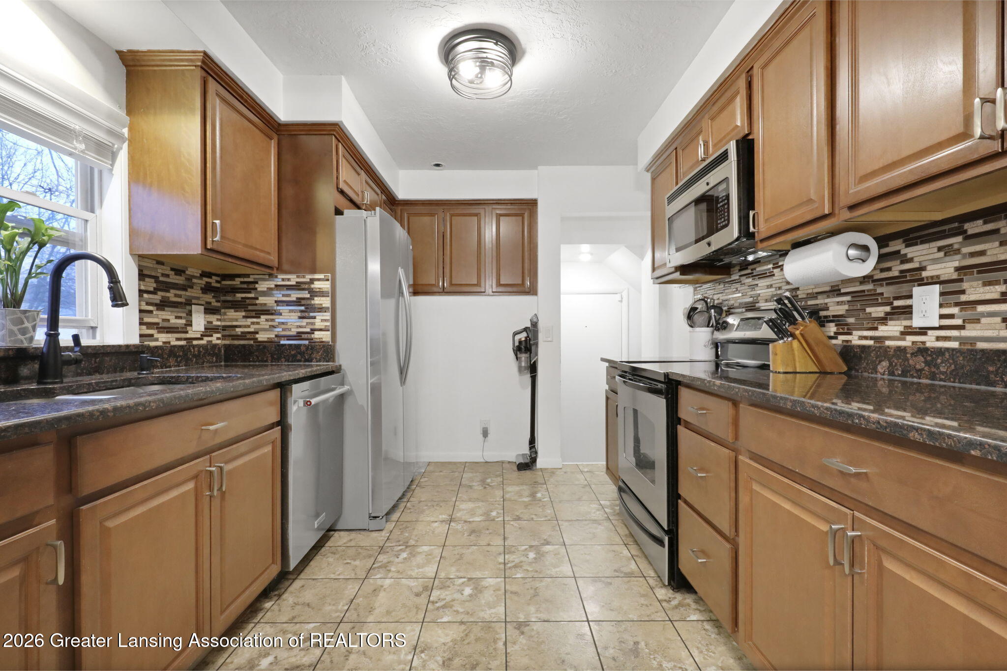 2505 Fairfax Road Lansing, MI 48910 - Photo 9 of 23 5-web-or-mls-Photo Feb 20 2026, 5 35 26