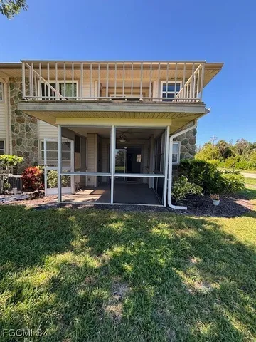 a view of a building with a garden