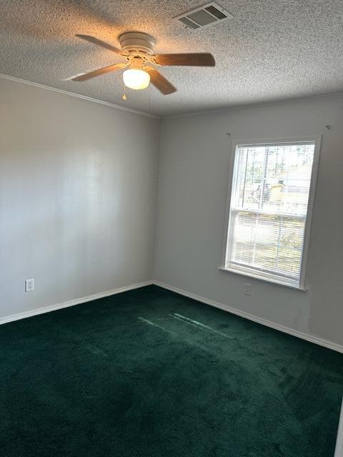 60 Magnolia Court Freeport, FL 32439 - Photo 12 of 29 a view of an empty room with windows and chandelier fan