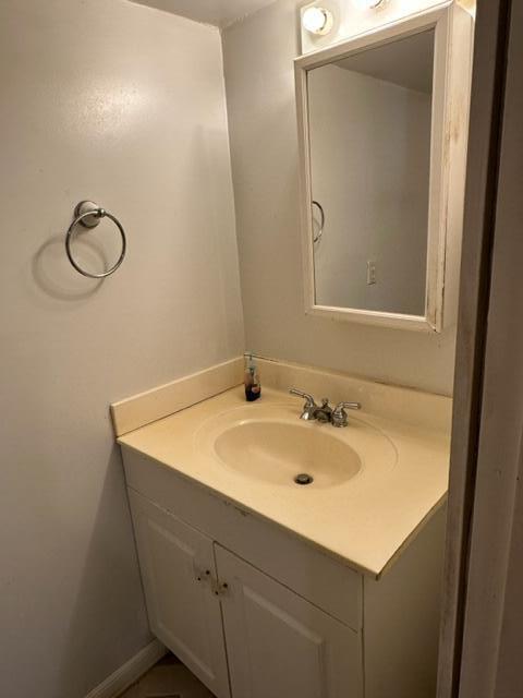 60 Magnolia Court Freeport, FL 32439 - Photo 17 of 29 a bathroom with a sink and a mirror