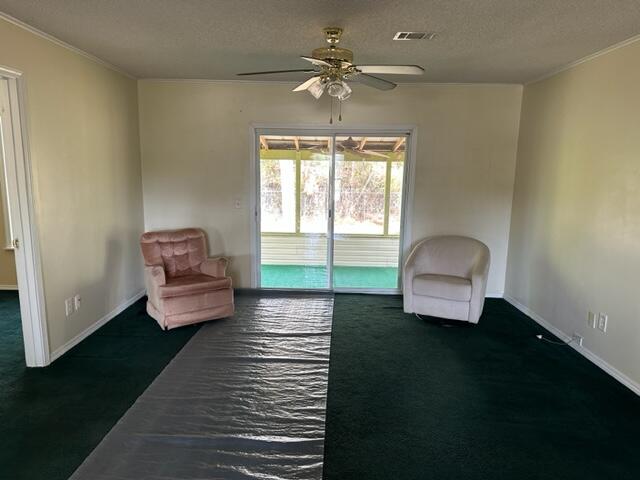 60 Magnolia Court Freeport, FL 32439 - Photo 22 of 29 a room with furniture and a potted plant