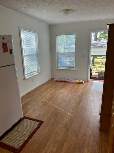 60 Magnolia Court Freeport, FL 32439 - Photo 3 of 29 a view of an empty room with a window and wooden floor