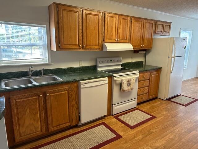 60 Magnolia Court Freeport, FL 32439 - Photo 5 of 29 a kitchen with stainless steel appliances granite countertop a sink a stove a refrigerator with grey cabinets