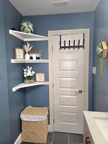 a white refrigerator freezer sitting inside of a kitchen