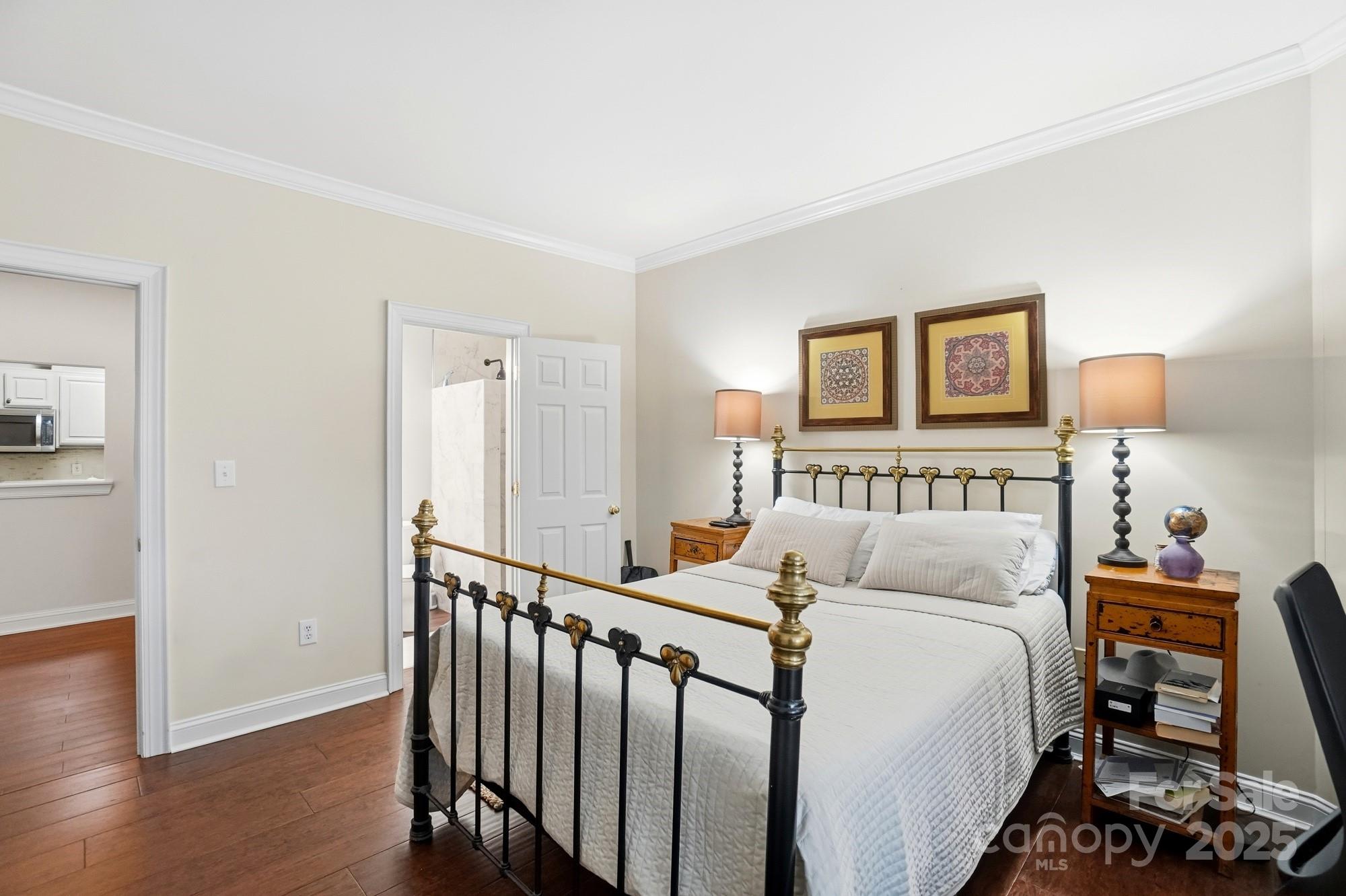 5617 Fairview Road, Unit 5 Charlotte, NC 28209 - Photo 15 of 26 a bedroom with a bed and a window
