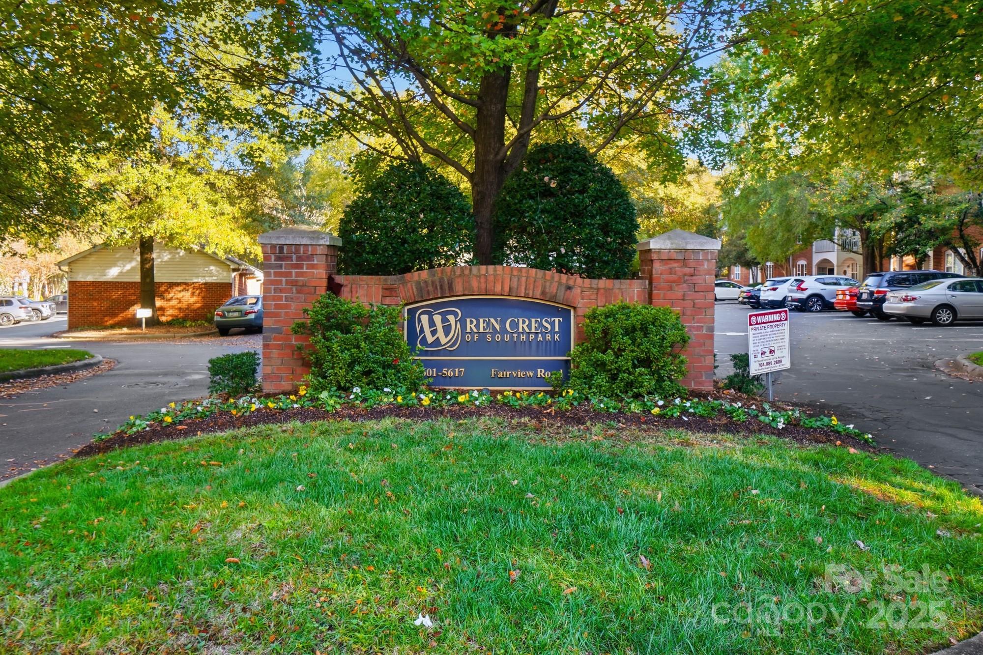 5617 Fairview Road, Unit 5 Charlotte, NC 28209 - Photo 2 of 26 a view of a park that has large trees