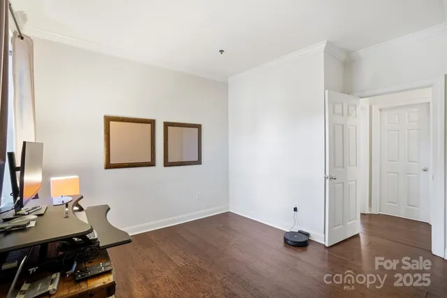 a workspace with furniture and mirror