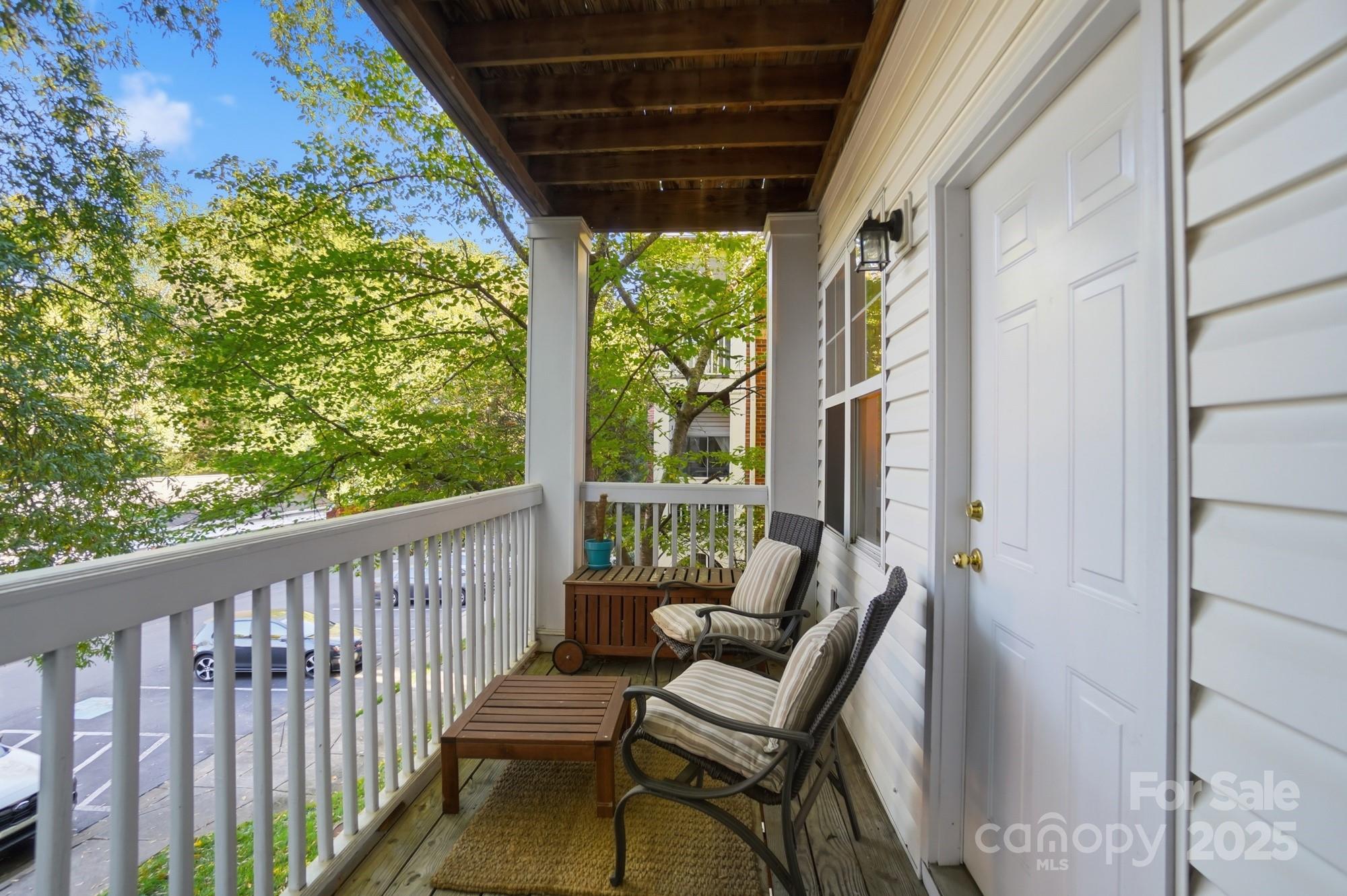 5617 Fairview Road, Unit 5 Charlotte, NC 28209 - Photo 24 of 26 a view of a two chairs in the balcony