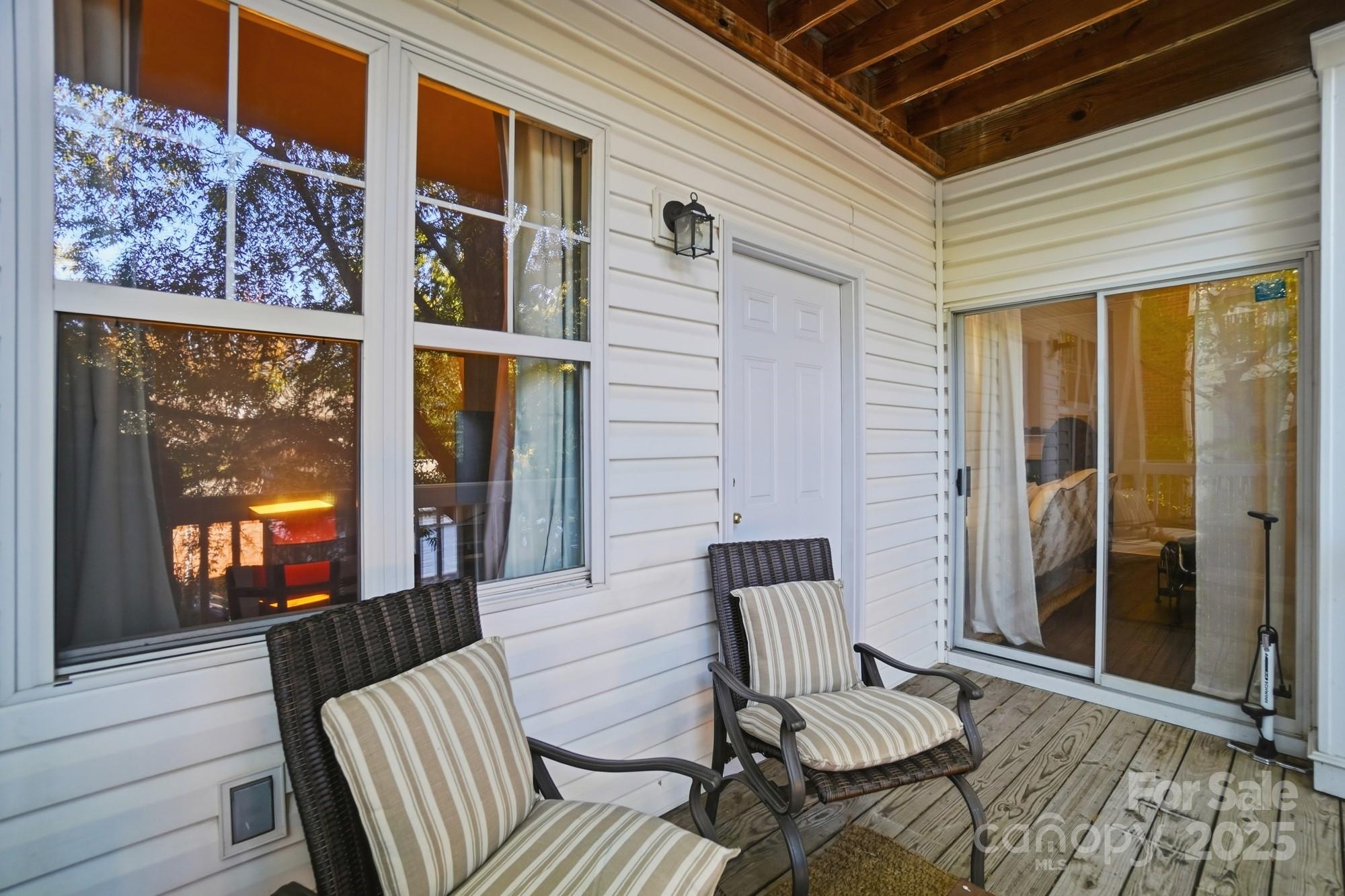 5617 Fairview Road, Unit 5 Charlotte, NC 28209 - Photo 25 of 26 a view of a two chairs in the balcony