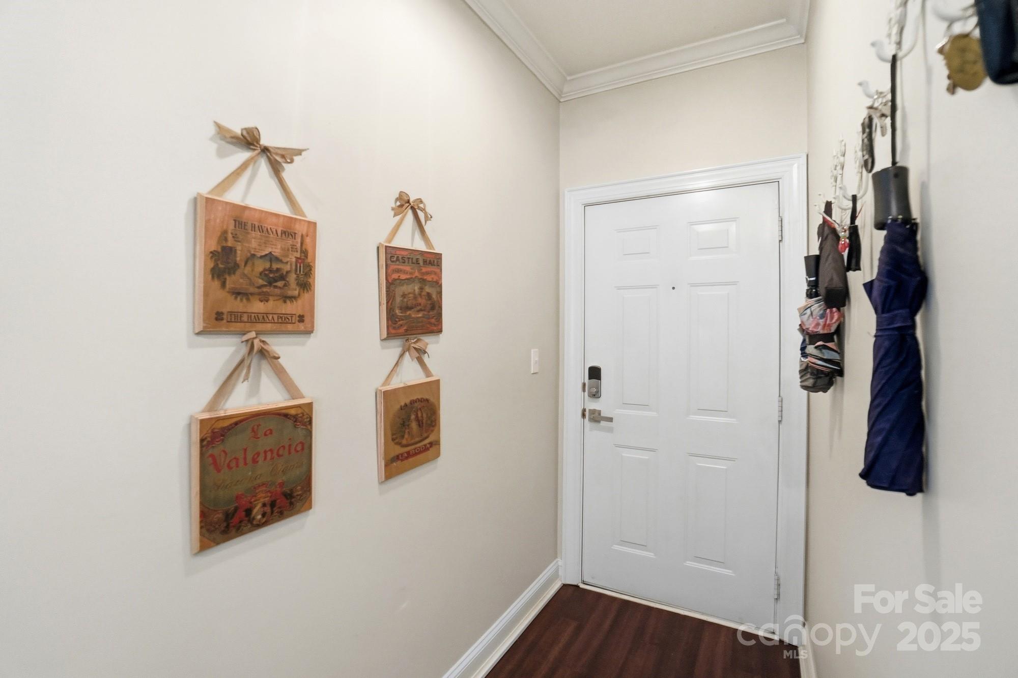 5617 Fairview Road, Unit 5 Charlotte, NC 28209 - Photo 5 of 26 a room that has a bed and a table in it