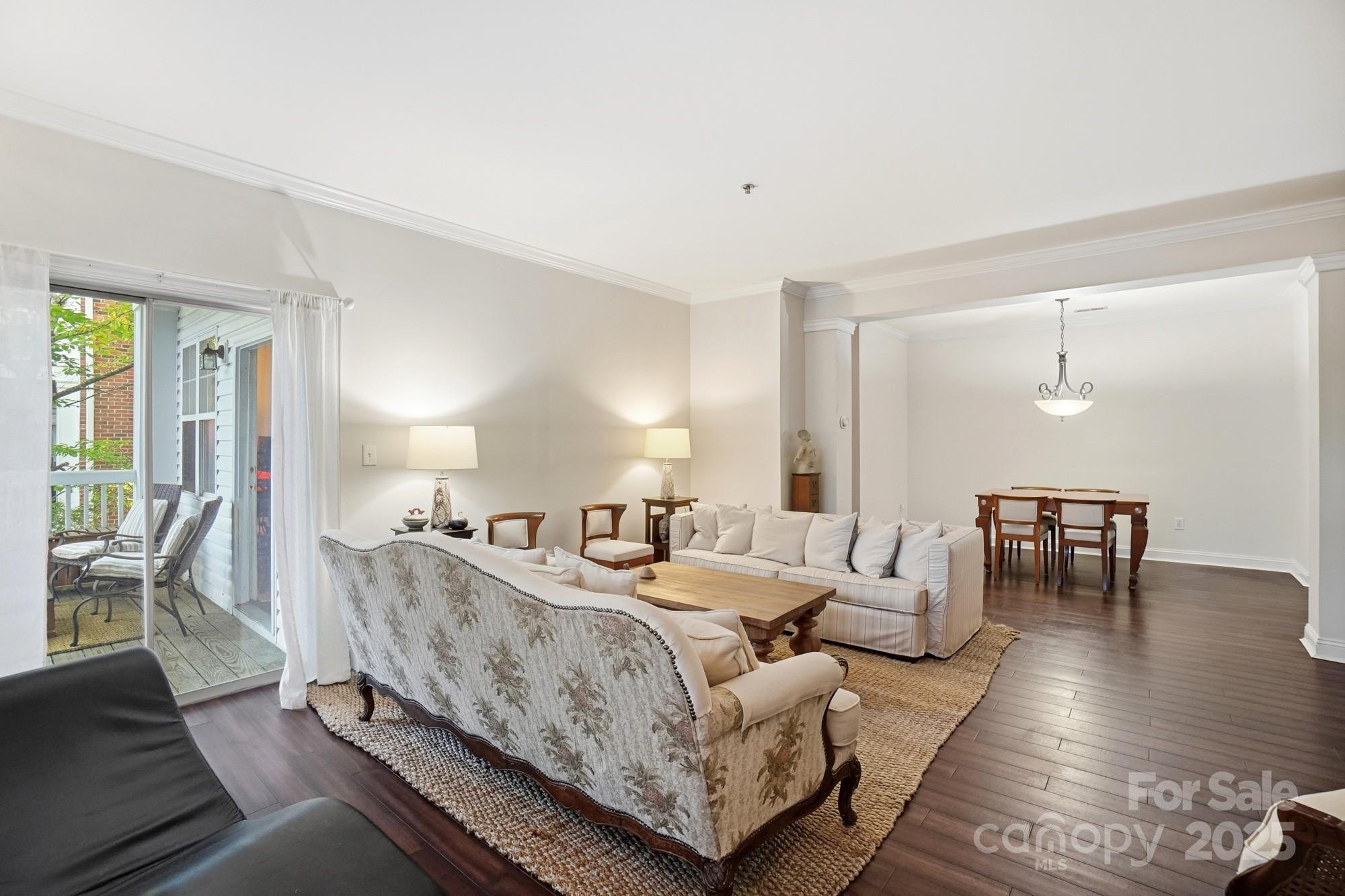 5617 Fairview Road, Unit 5 Charlotte, NC 28209 - Photo 6 of 26 a living room with furniture and a table