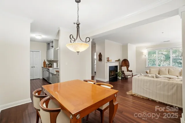 a very nice looking dining room with a table and chairs