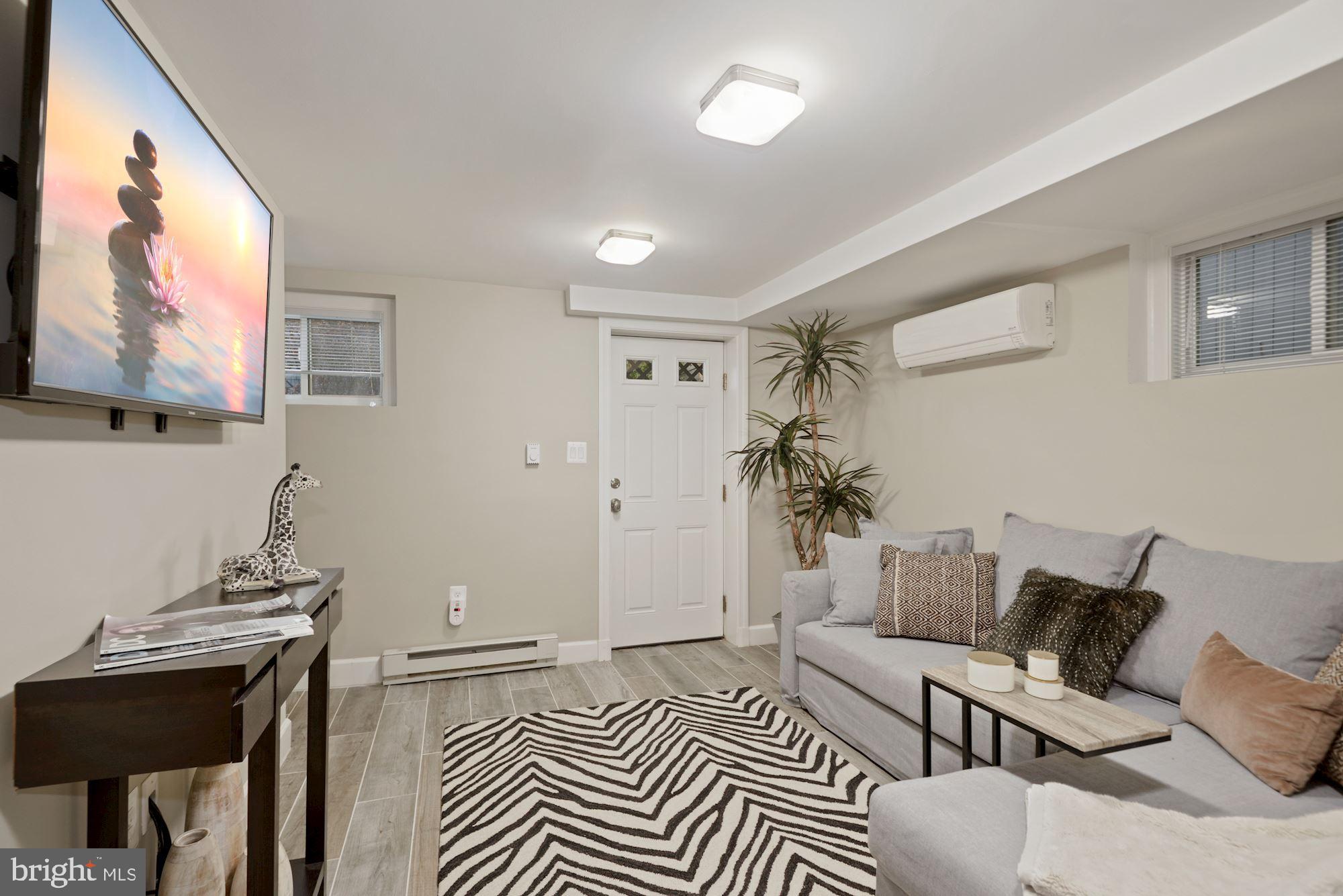 4107 Fessenden Street Northwest Washington, DC 20016 - Photo 41 of 52 Lower Level Rec Room with rear access