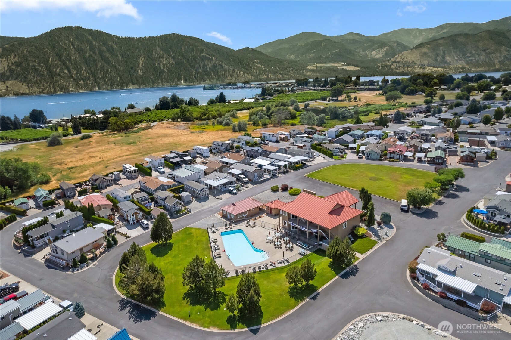 1000 Highway 150, Unit 17 Manson, WA 98831 - Photo 13 of 15 an aerial view of a house with a swimming pool