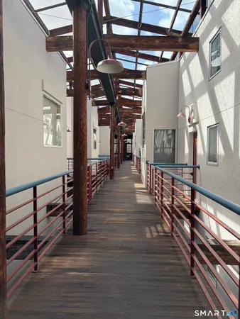 a sink with a granite countertop lots of counter space and a sink