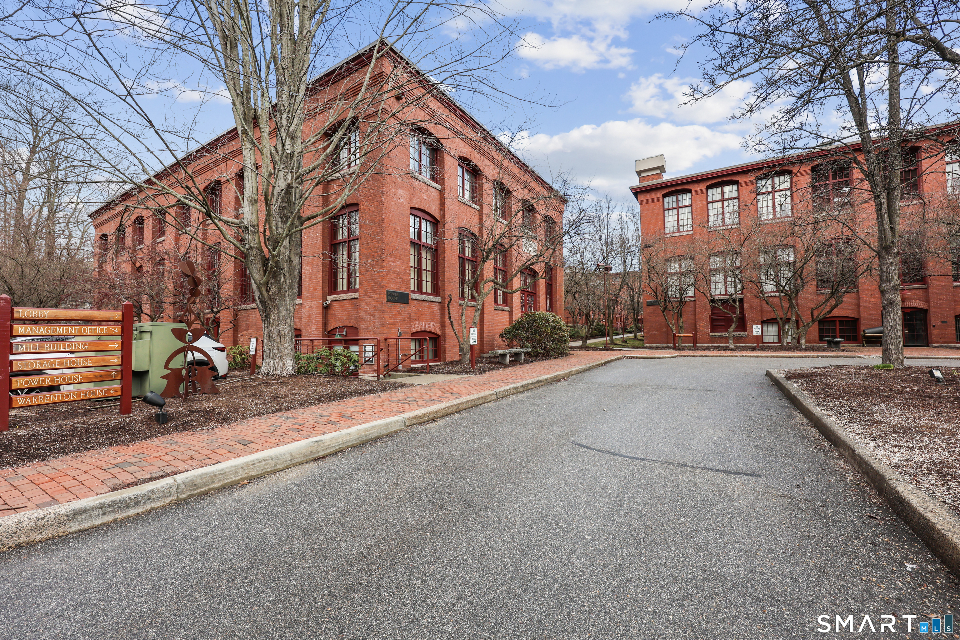 839 Main Street, Unit 73 Torrington, CT 06790 - Photo 2 of 22 a view of a street with a building