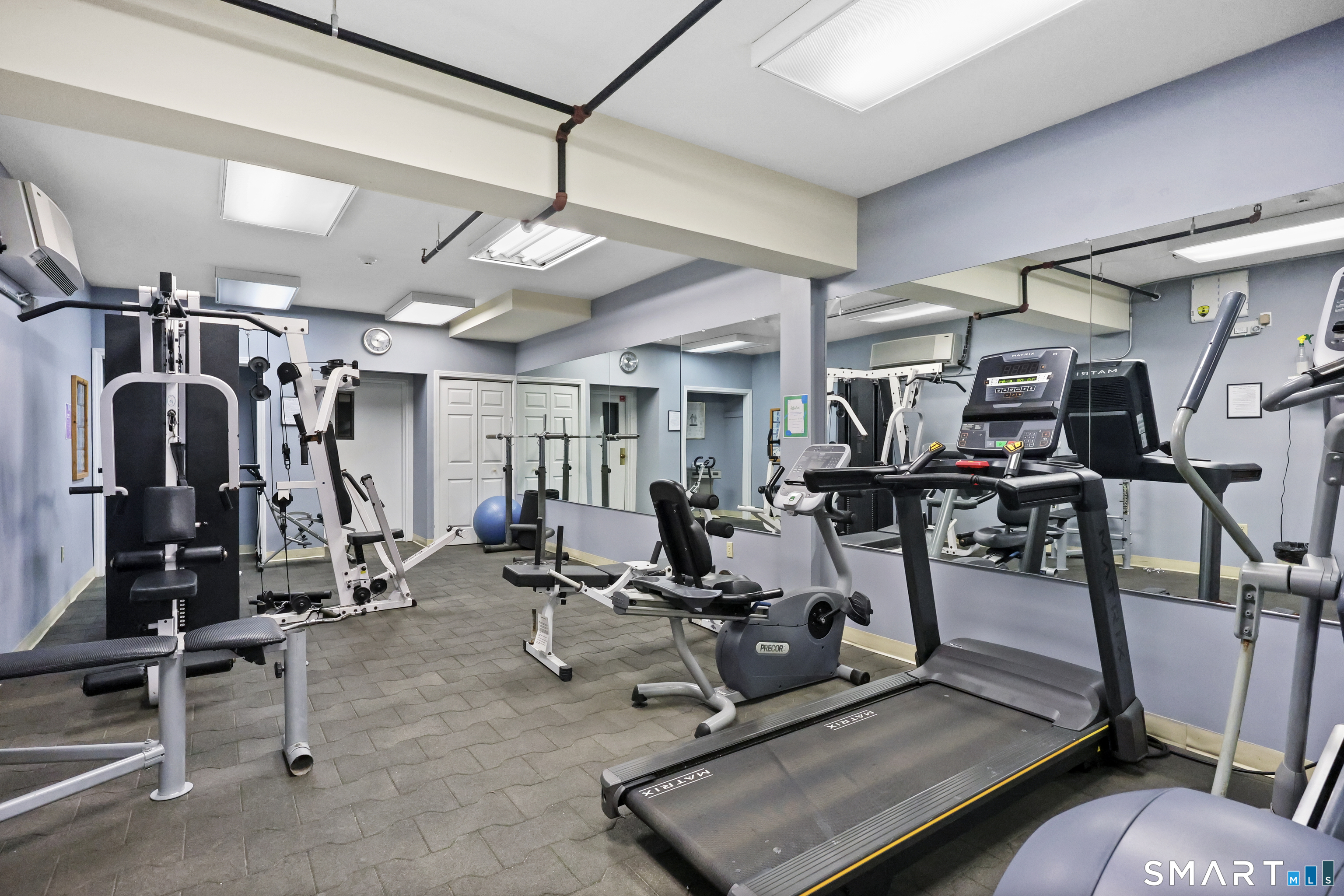 839 Main Street, Unit 73 Torrington, CT 06790 - Photo 22 of 22 a view of a room with gym equipment