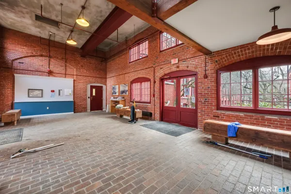 a view of front door with outdoor seating