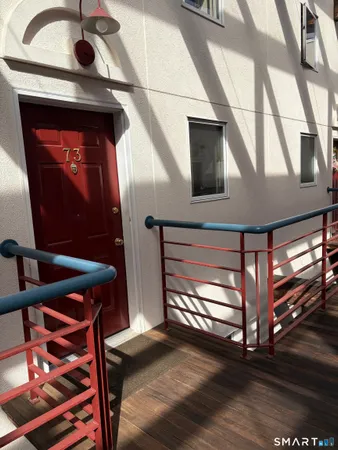 a view of entryway with a front door