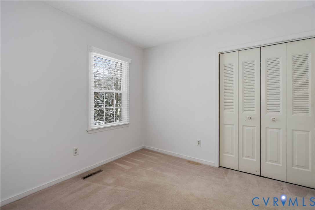 351 Walton Park Road Midlothian, VA 23114 - Photo 11 of 29 Unfurnished bedroom featuring light carpet and a c