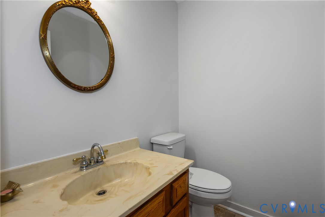 351 Walton Park Road Midlothian, VA 23114 - Photo 12 of 29 Half bath with vanity and toilet
