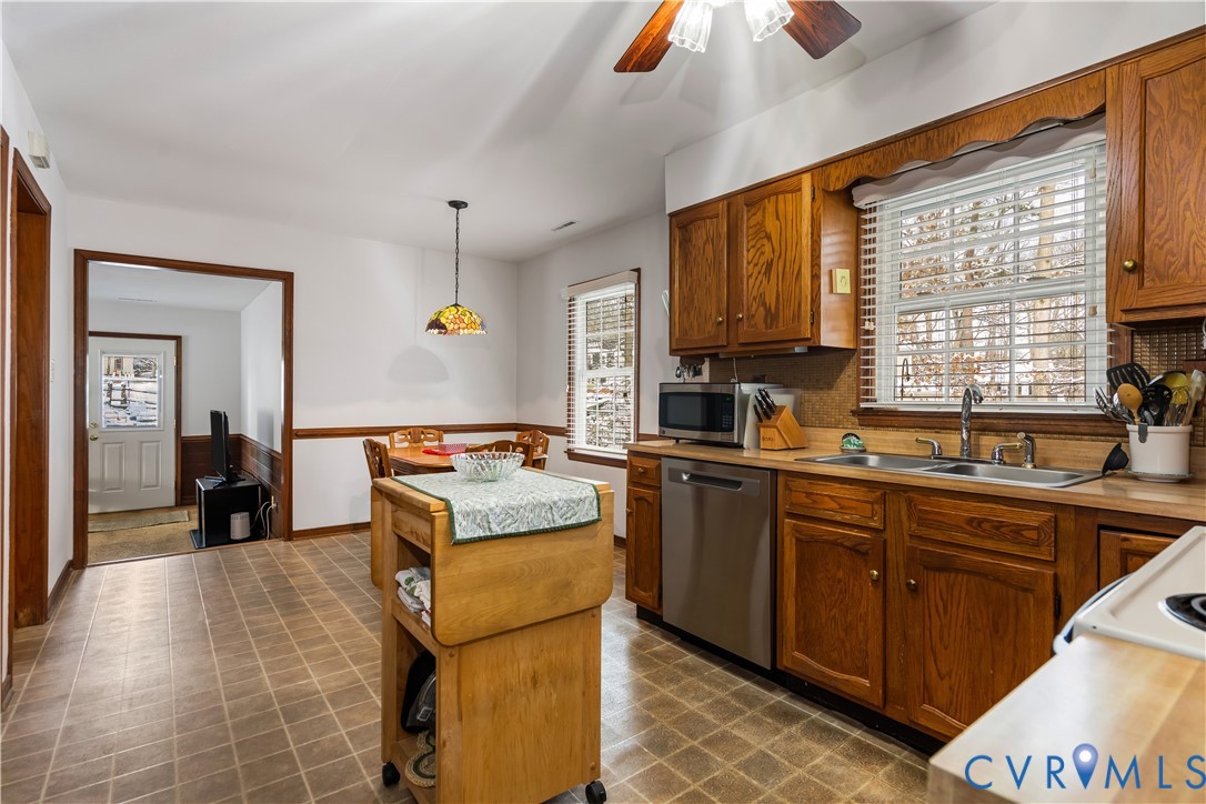 351 Walton Park Road Midlothian, VA 23114 - Photo 16 of 29 Kitchen featuring light countertops, stainless ste