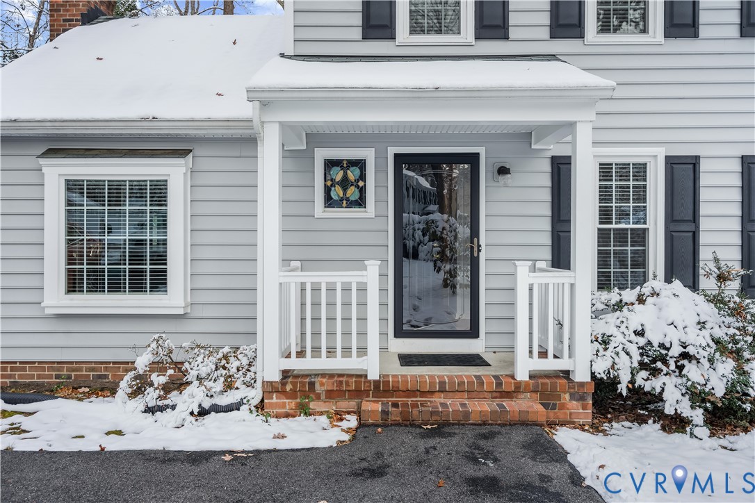 351 Walton Park Road Midlothian, VA 23114 - Photo 3 of 29 Snow covered property entrance featuring a porch a