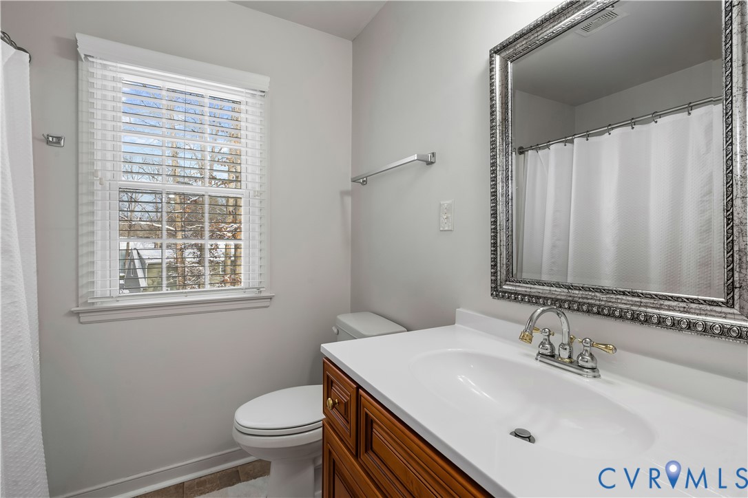 351 Walton Park Road Midlothian, VA 23114 - Photo 8 of 29 Full bath featuring a shower with curtain, vanity,