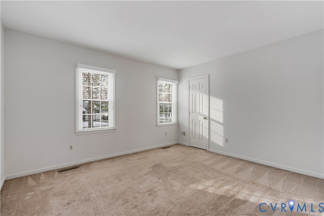 351 Walton Park Road Midlothian, VA 23114 - Photo 9 of 29 Unfurnished bedroom featuring light carpet and a c