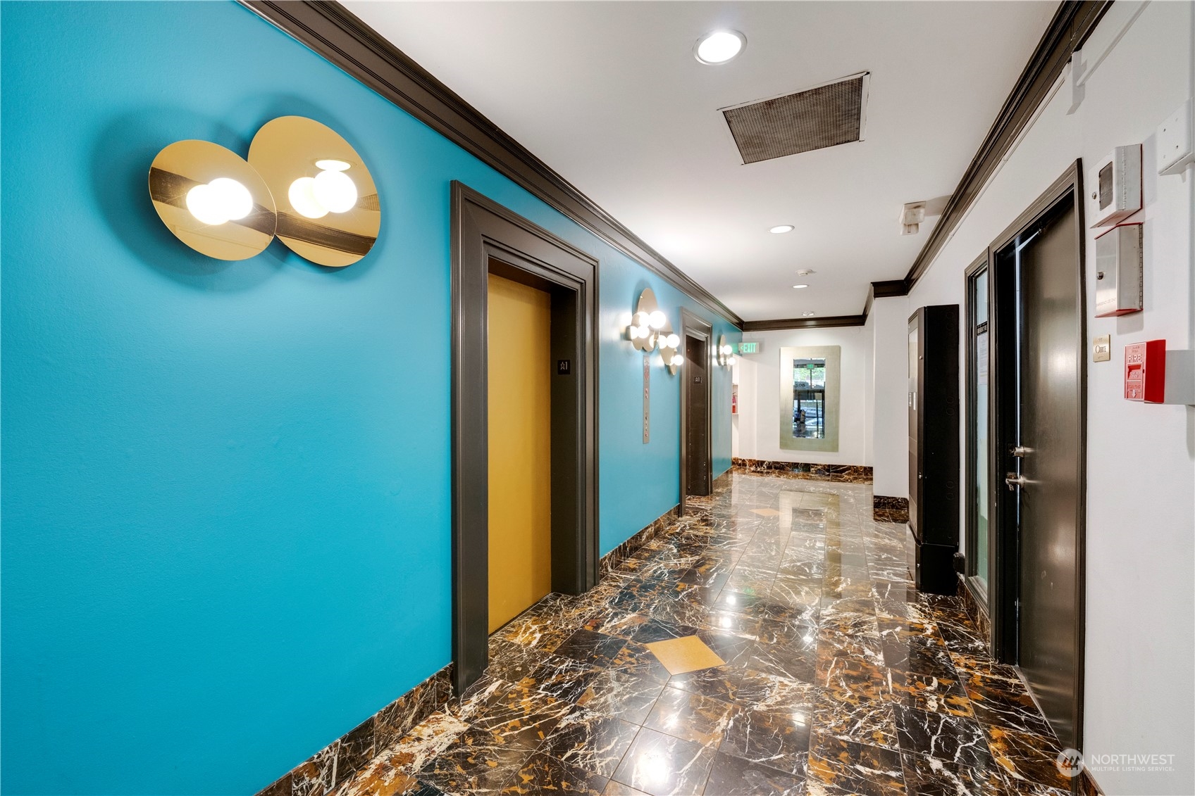 1105 Spring Street, Unit 309 Seattle, WA 98104 - Photo 36 of 39 a view of a hallway