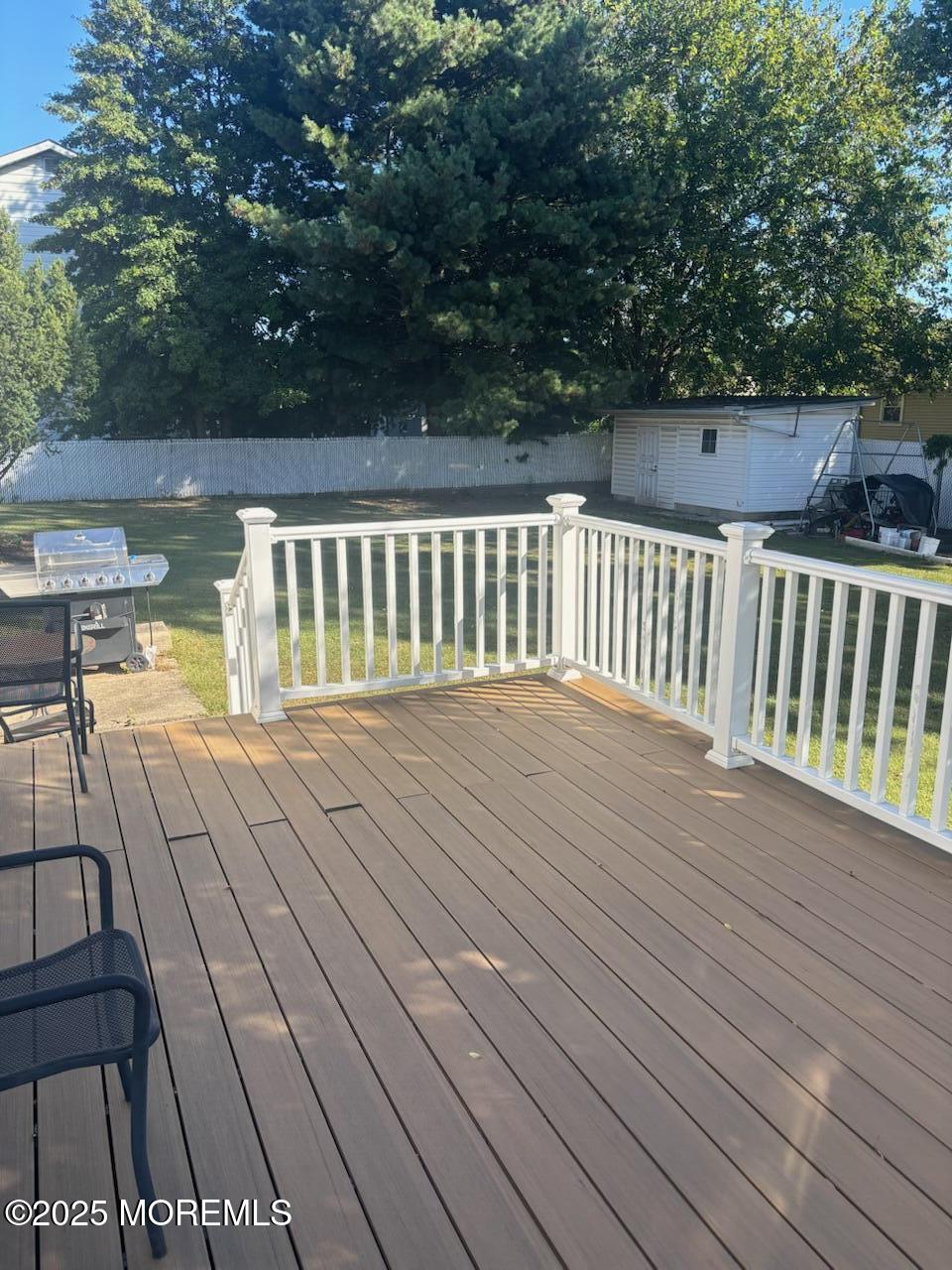 7 Candy Court Edison, NJ 08817 - Photo 3 of 18 a view of balcony with wooden floor and lake view