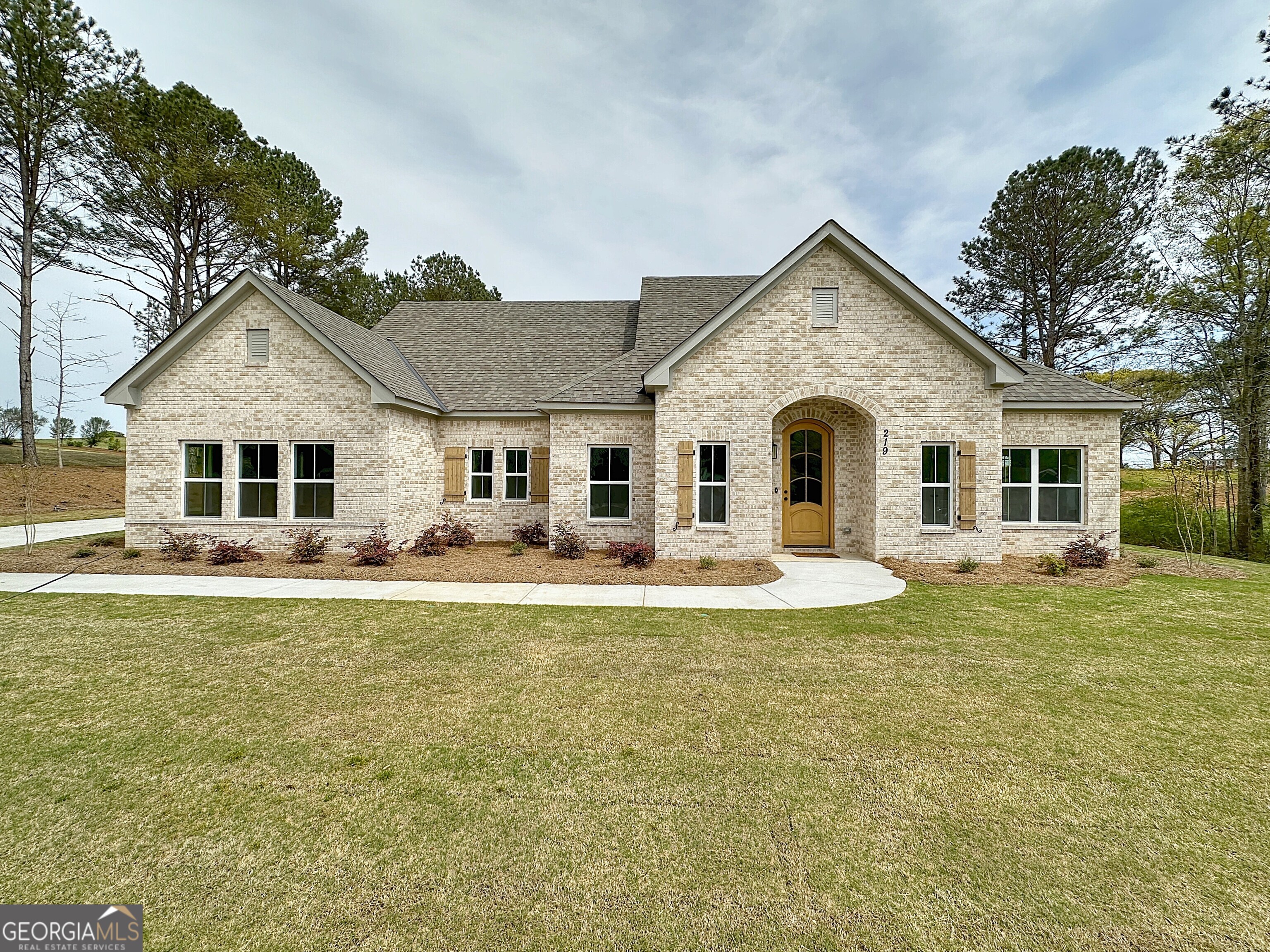219 South Smith Road LaGrange, GA 30241 - Photo 1 of 1 a front view of a house with swimming pool