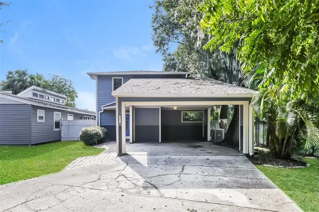 a view of a house with a garden