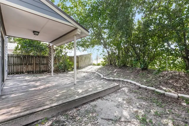 a view of backyard with green space