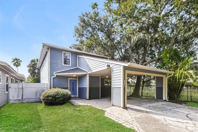 front view of a house with a yard