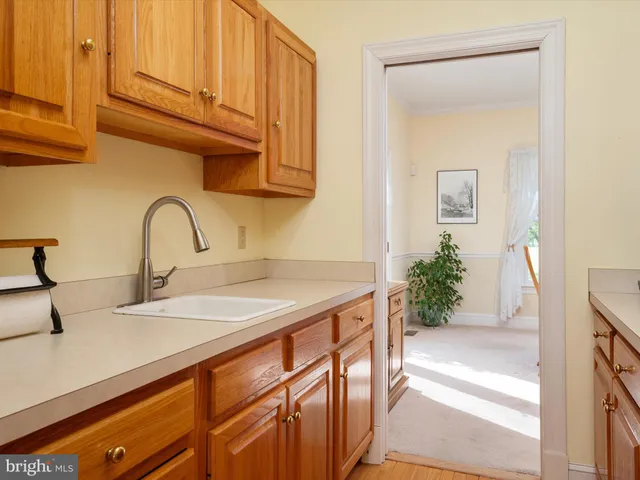 a bedroom with a large bed and a couch