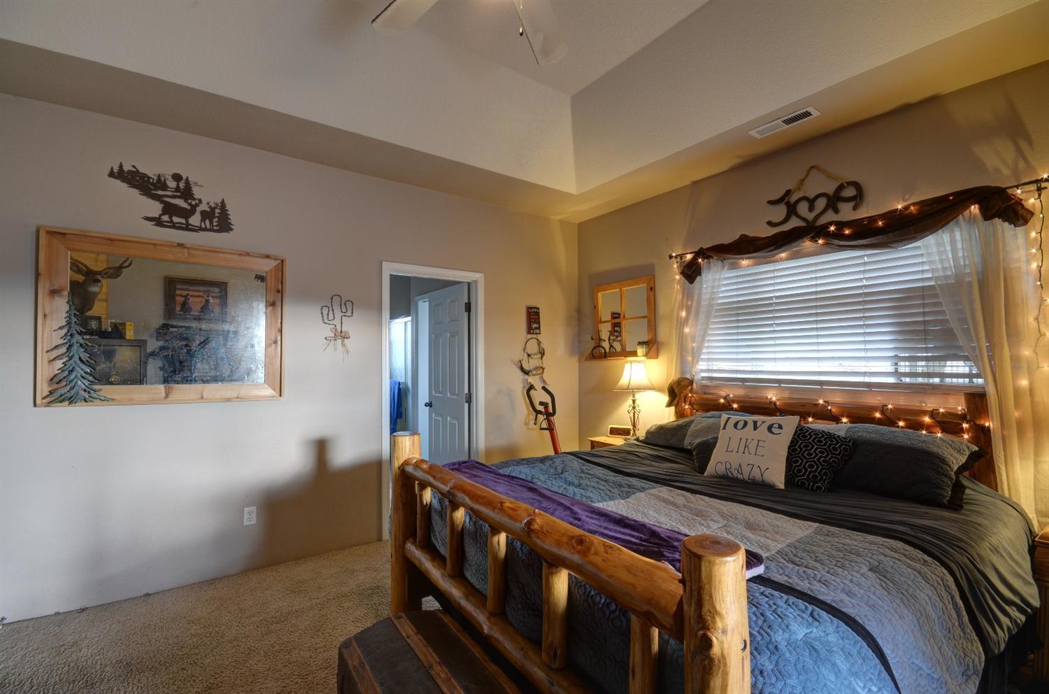 917 Ridgeview Drive Eagle Point, OR 97524 - Photo 17 of 31 a bedroom with a bed and a dresser