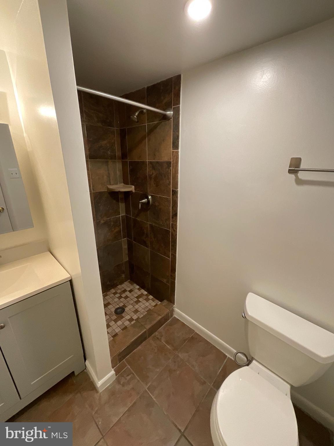 4509 Romlon Street, Unit 102 Beltsville, MD 20705 - Photo 12 of 22 a bathroom with a sink and a toilet