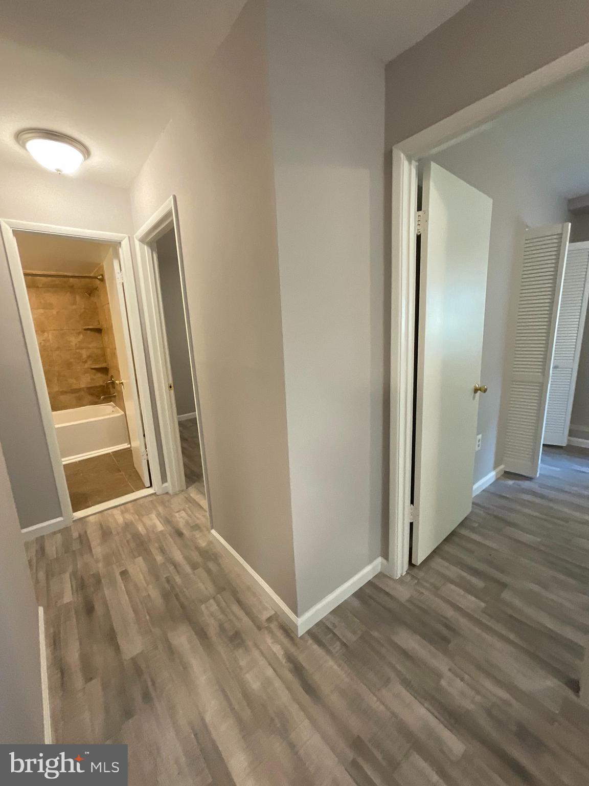 4509 Romlon Street, Unit 102 Beltsville, MD 20705 - Photo 8 of 22 a view of a hallway