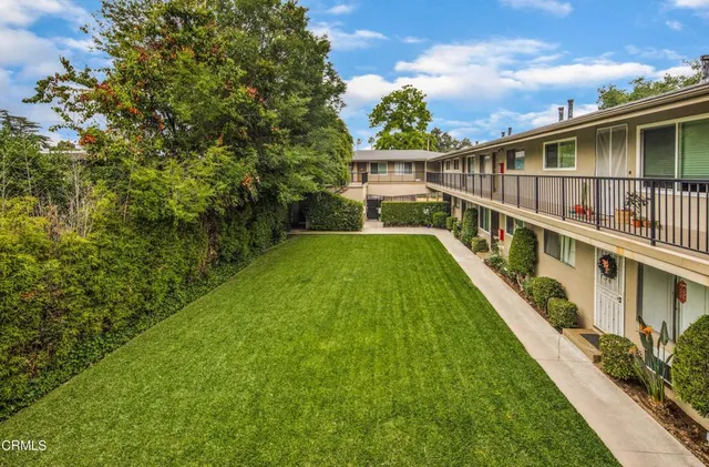 a view of an house with a swimming pool