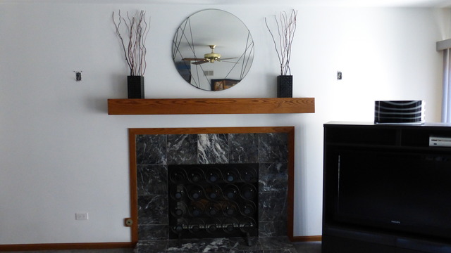 3 Commons Drive Palos Park, IL 60464 - Photo 4 of 9 a living room with furniture and a fireplace