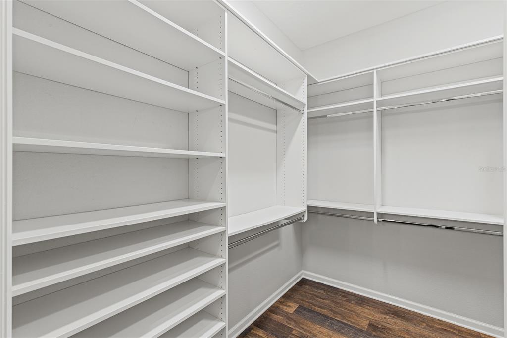 11202 Roz Way Oxford, FL 34484 - Photo 27 of 44 a view of an empty walk in closet