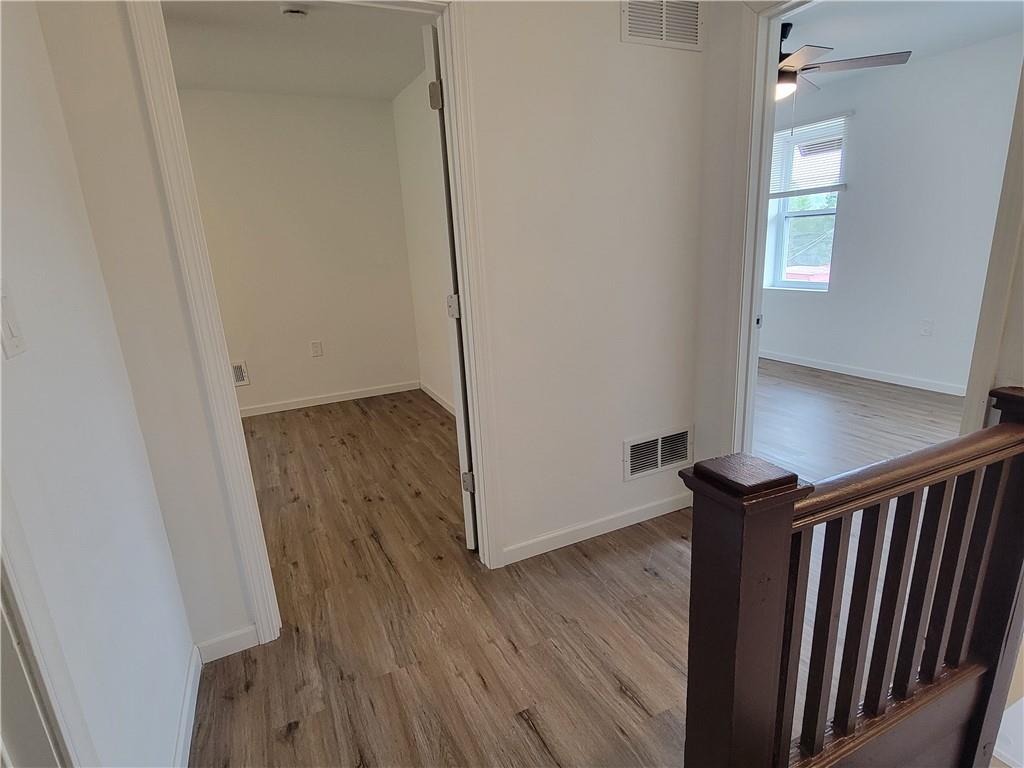 518 5th Avenue Coraopolis, PA 15108 - Photo 13 of 18 a view of a hallway with wooden floor