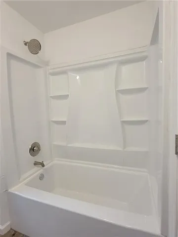 a bathroom with a bathtub