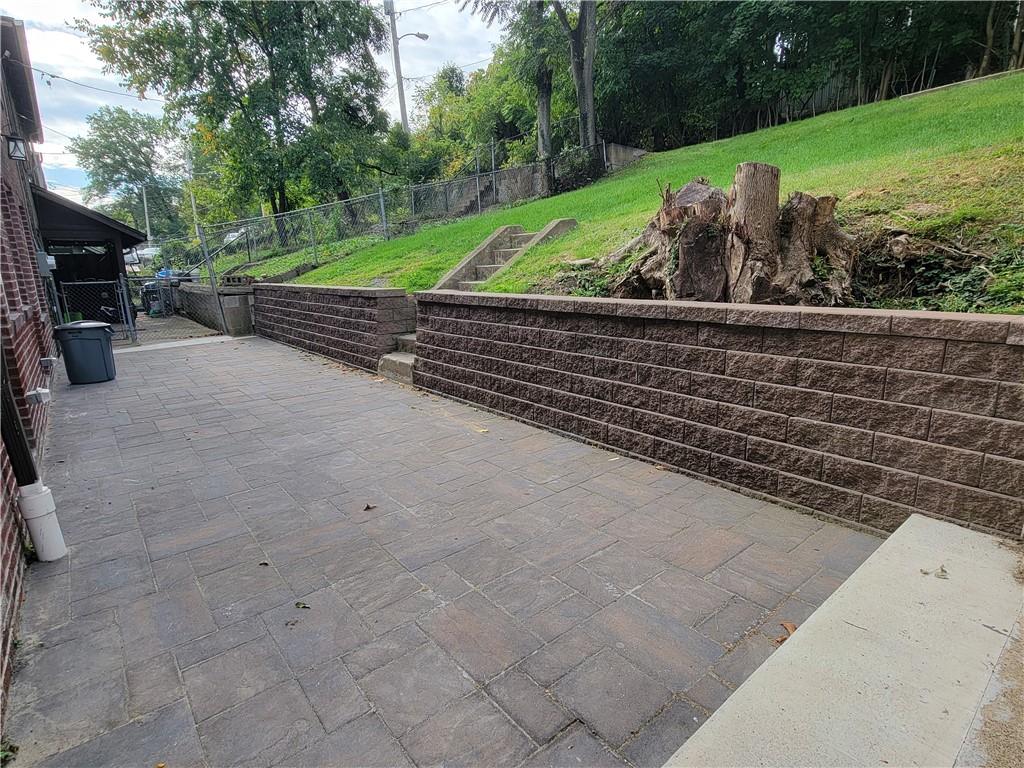 518 5th Avenue Coraopolis, PA 15108 - Photo 3 of 18 a view of a yard with potted plants
