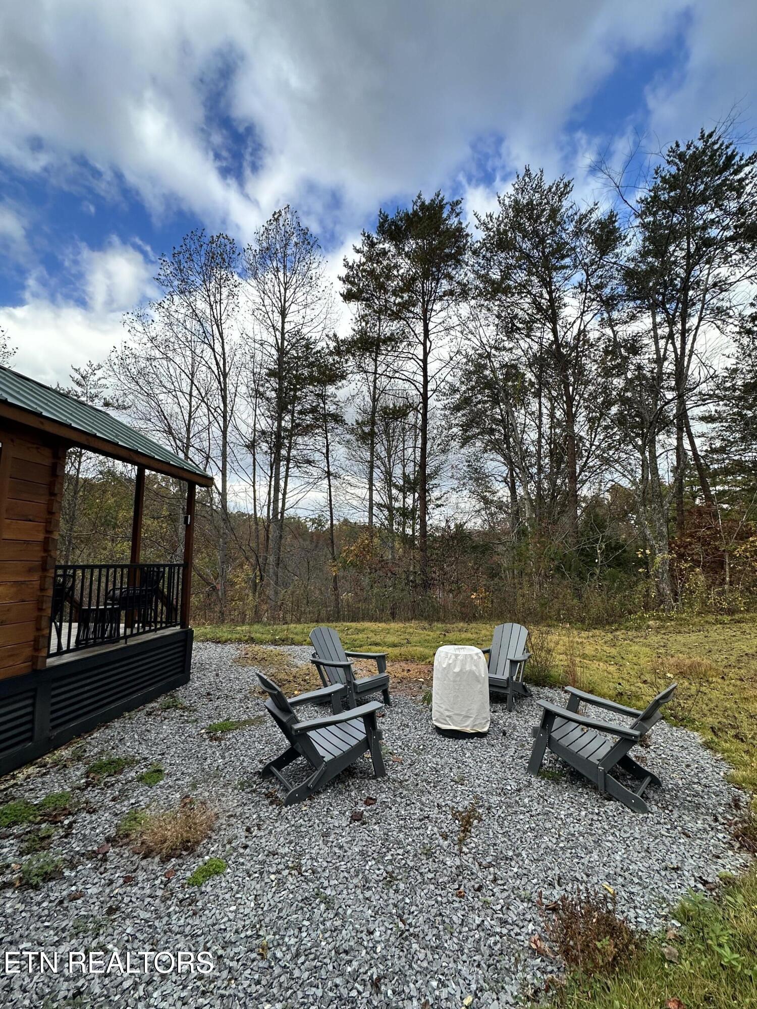 1652 Shady Grove Road Sevierville, TN 37876 - Photo 9 of 24 1652 Shady Grove Rd. fire pit & chairs