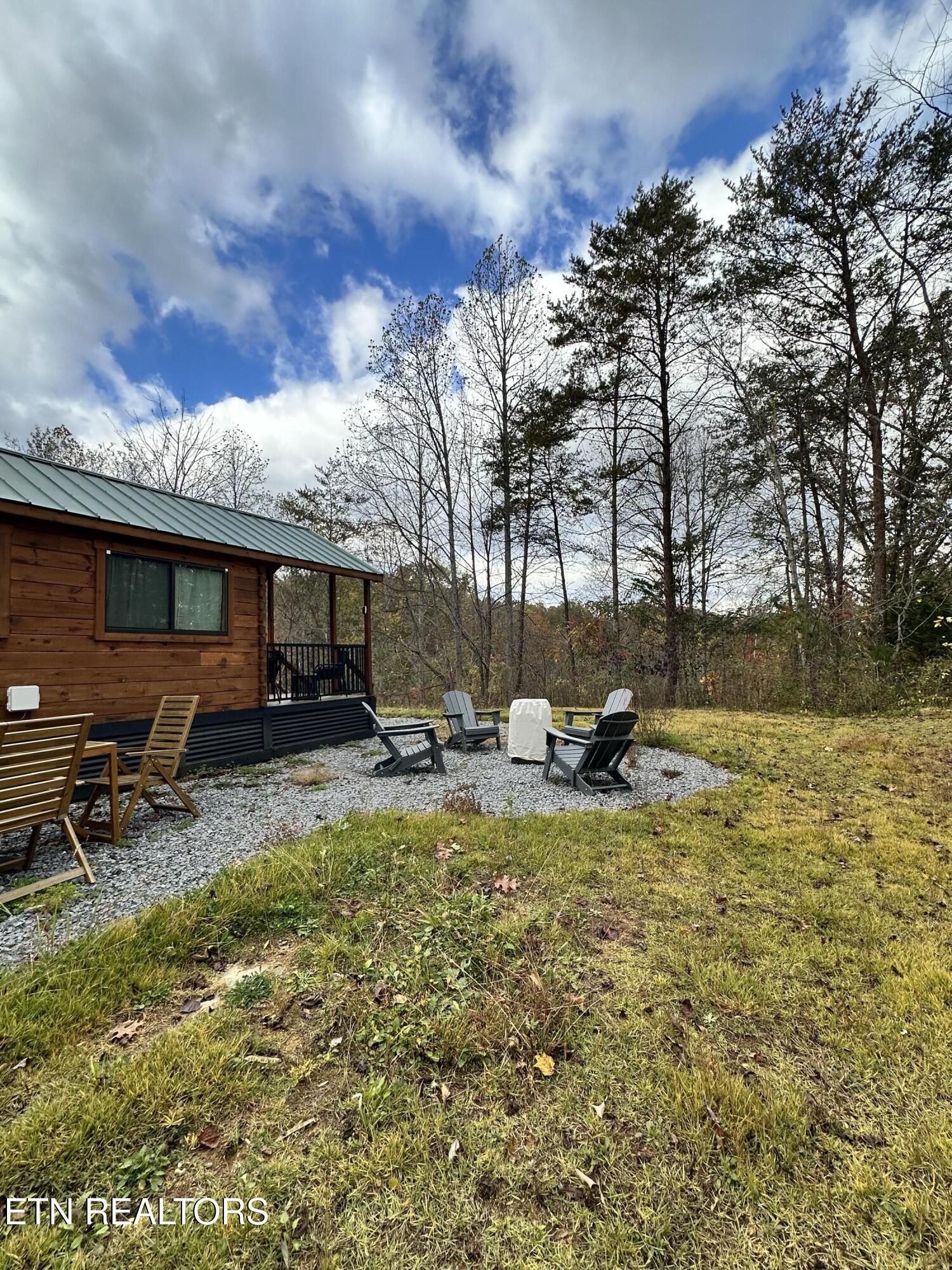 1652 Shady Grove Road Sevierville, TN 37876 - Photo 10 of 24 1652 Shady Grove Rd. fire pit and chair